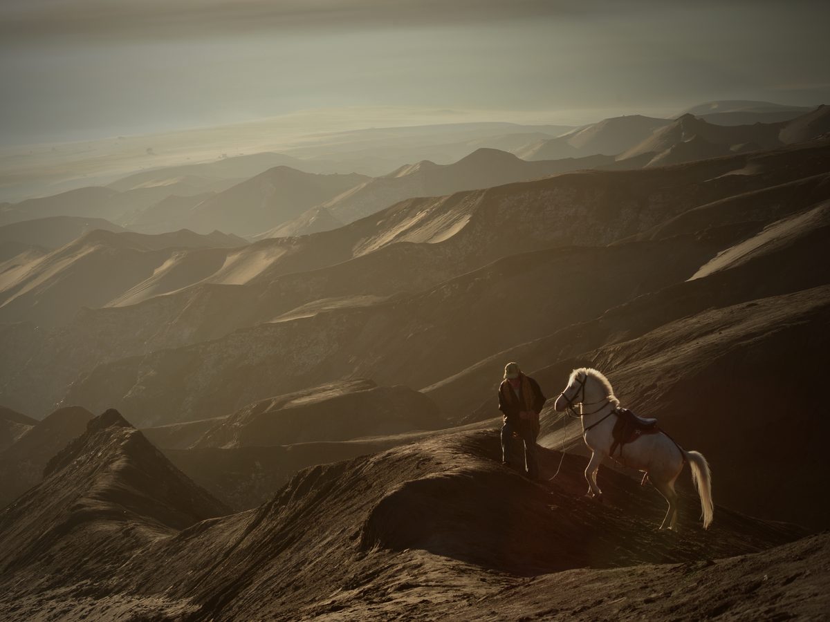 Wide cinematic landscape at golden hour — the kind of master that ships when delivery clears